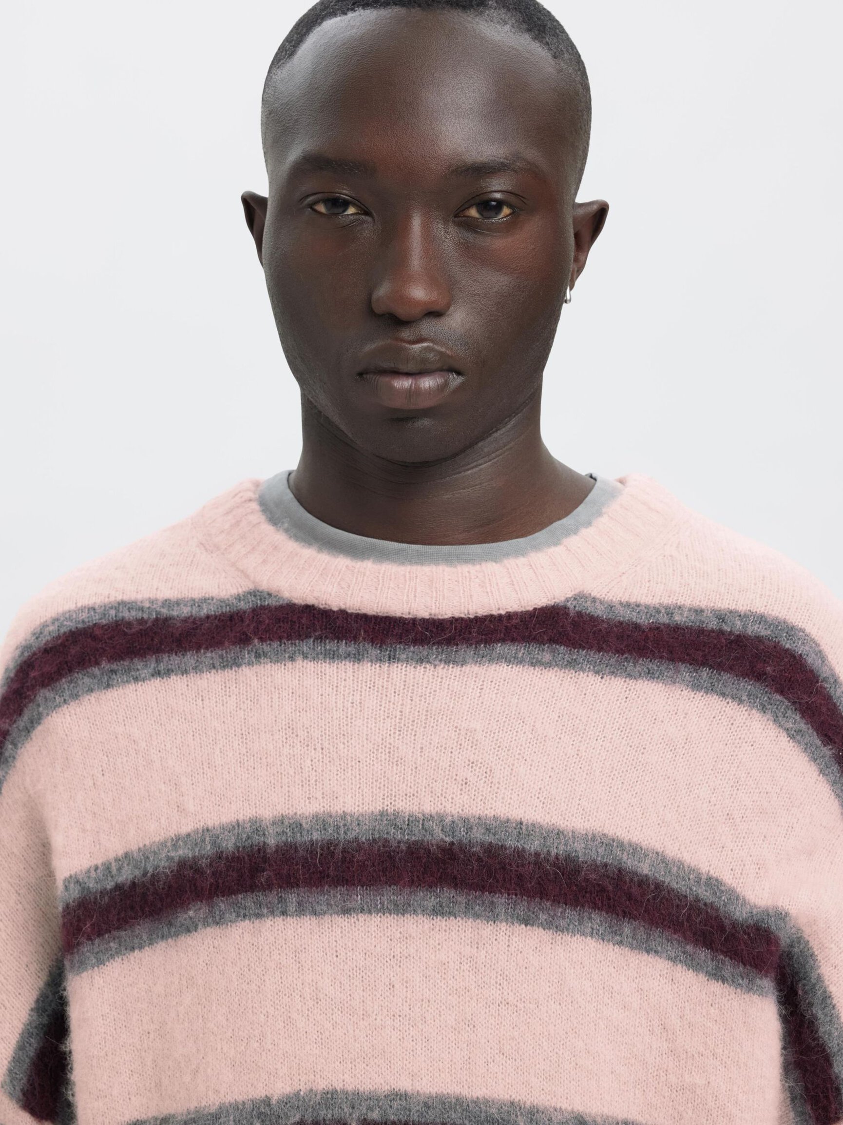 STRIPED KNITTED PULLOVER
