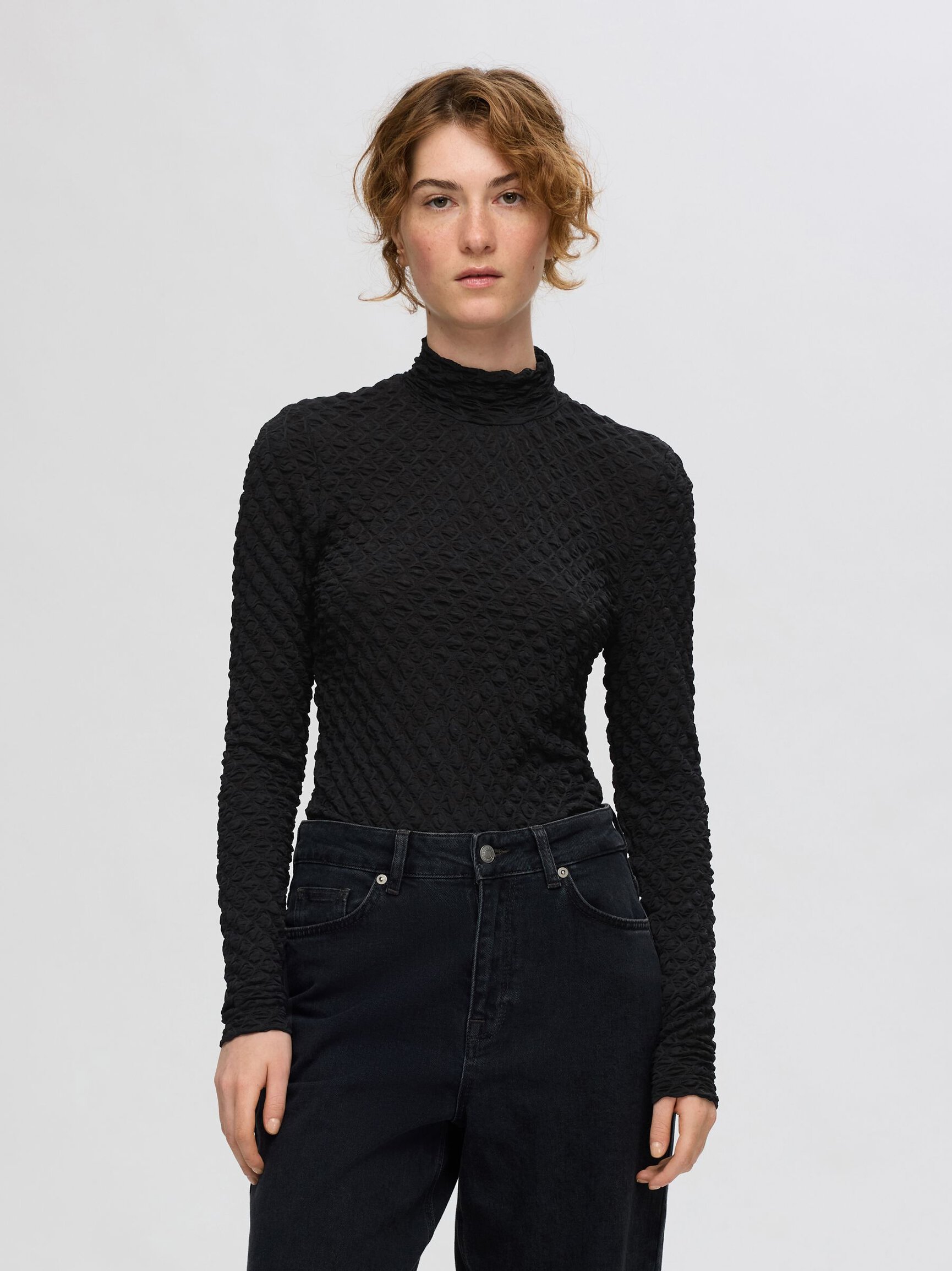 TEXTURED LONG SLEEVED TOP