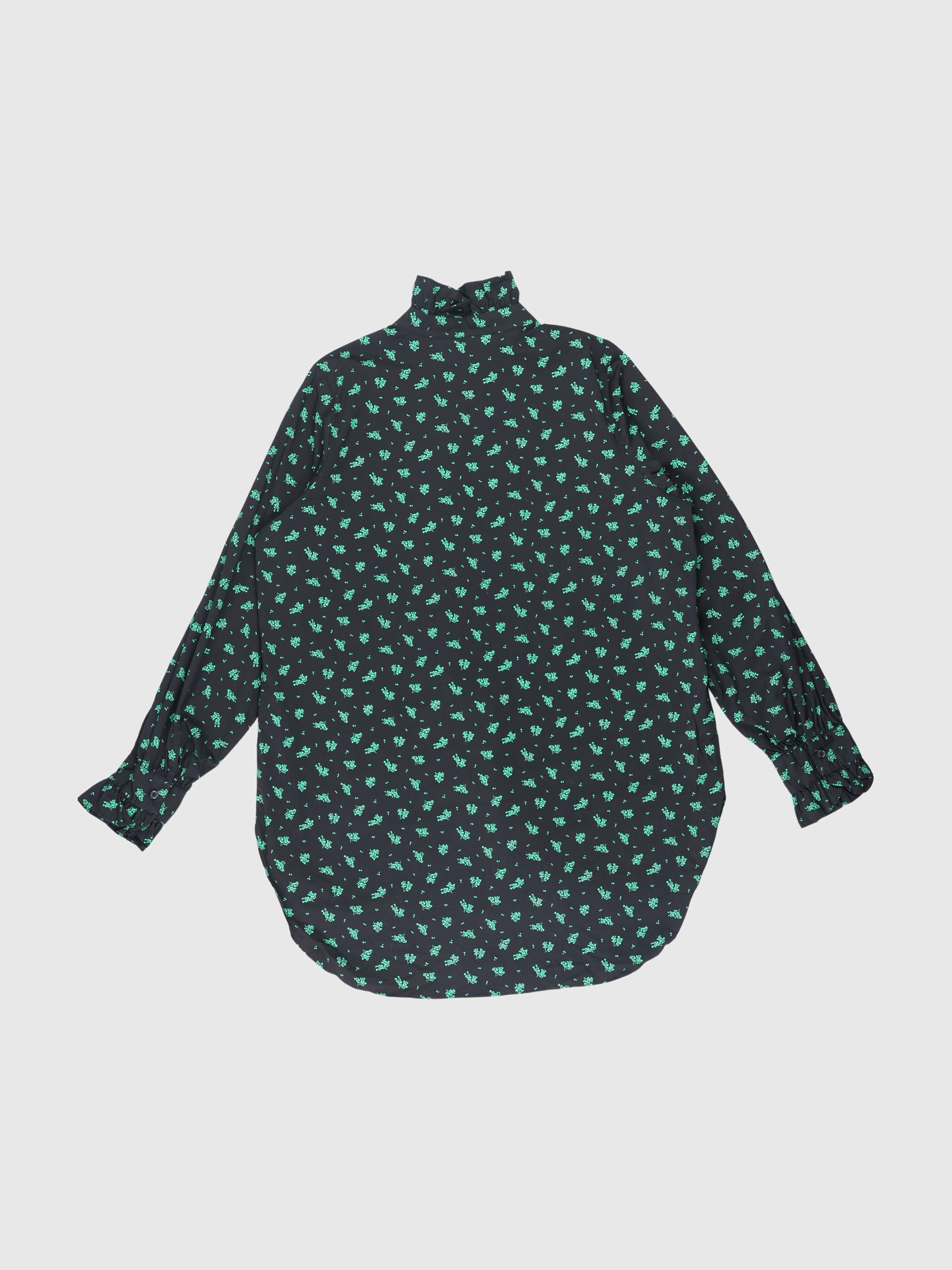 DÉTAIL VOLANT CHEMISE À MANCHES LONGUES