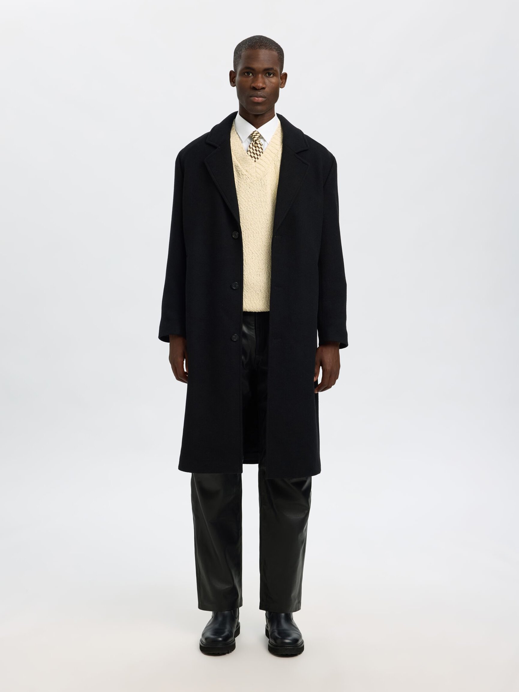 STRAIGHT FIT LEATHER TROUSERS