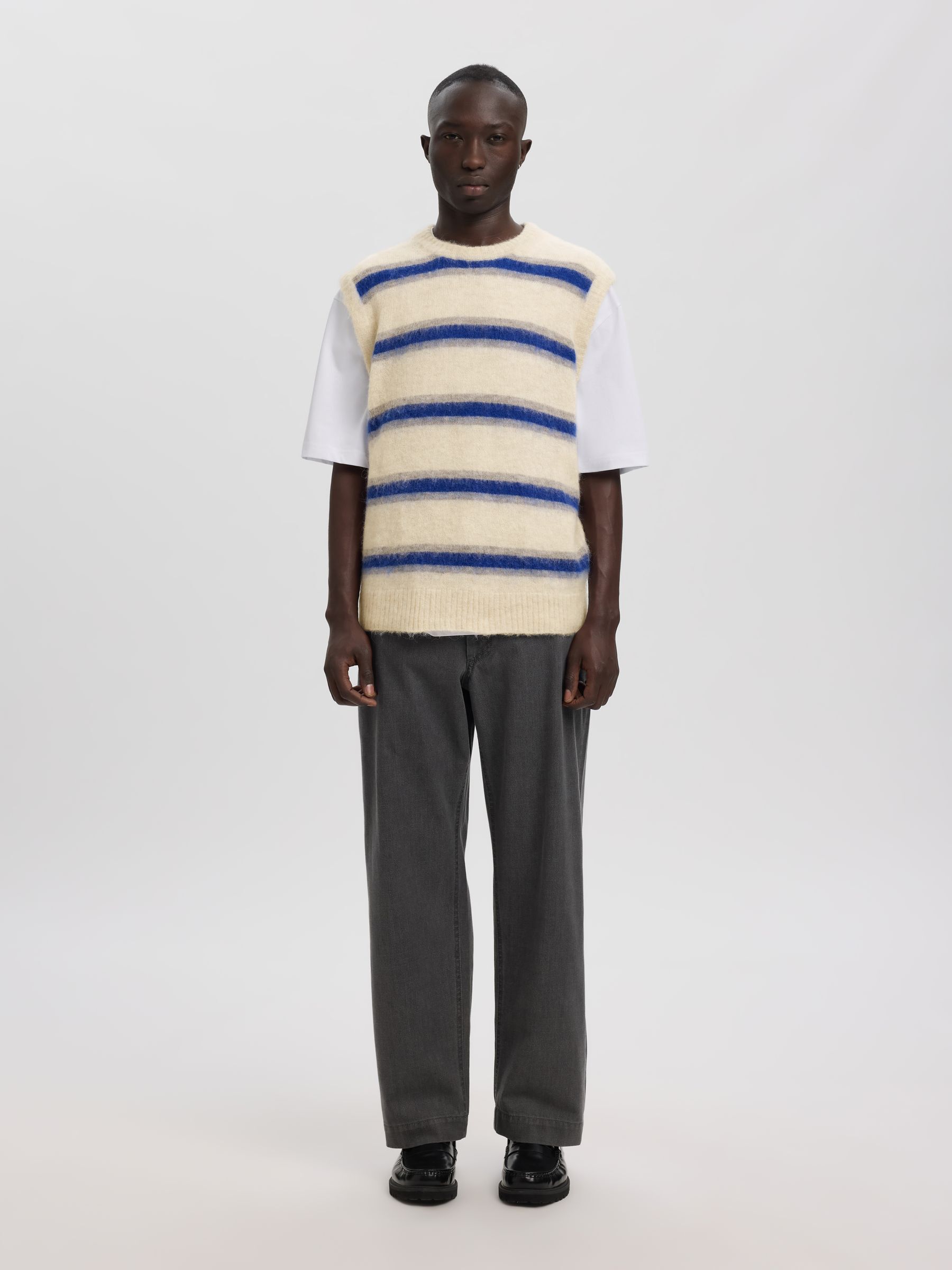 STRIPED KNITTED VEST