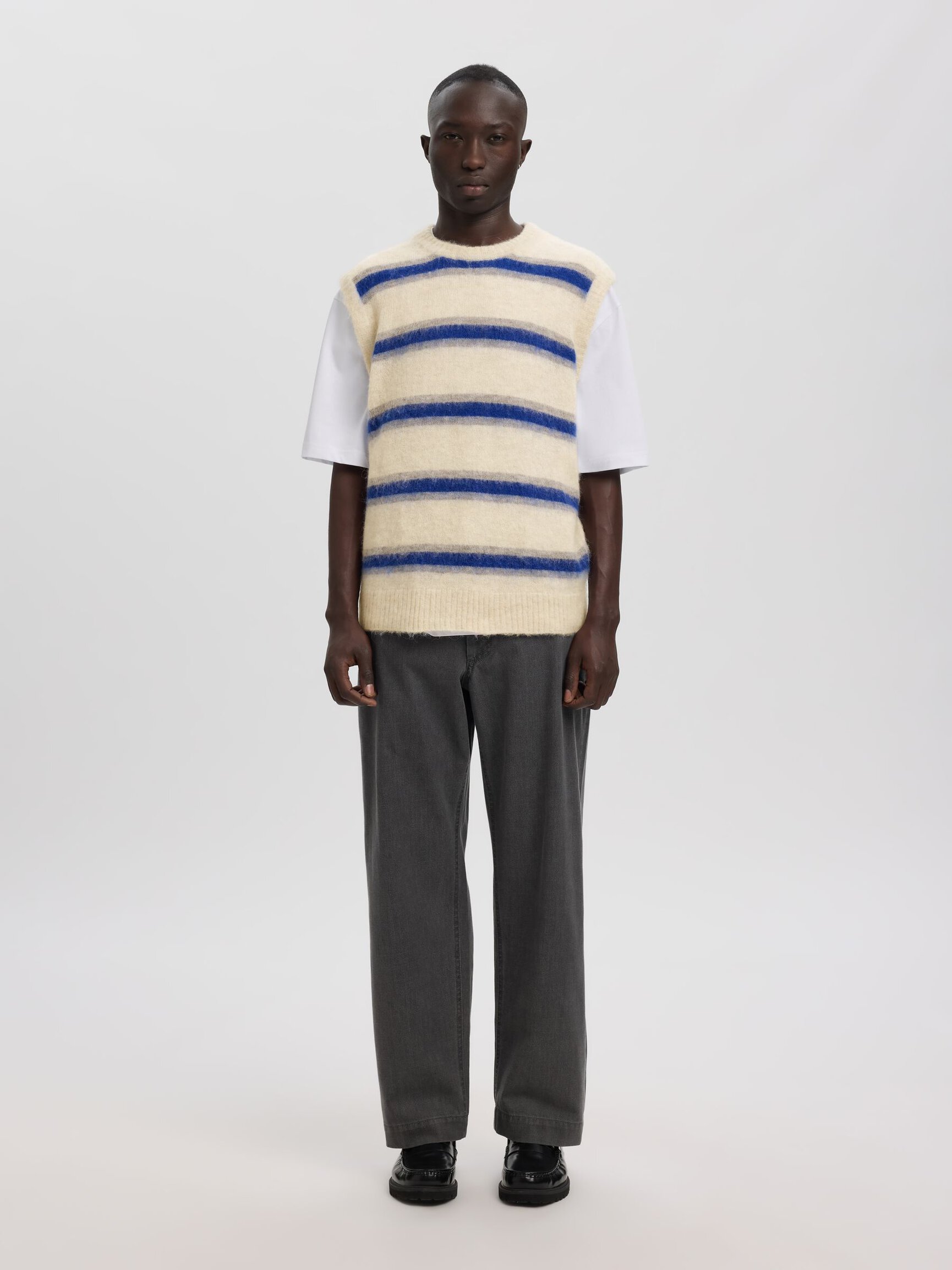 STRIPED KNITTED VEST