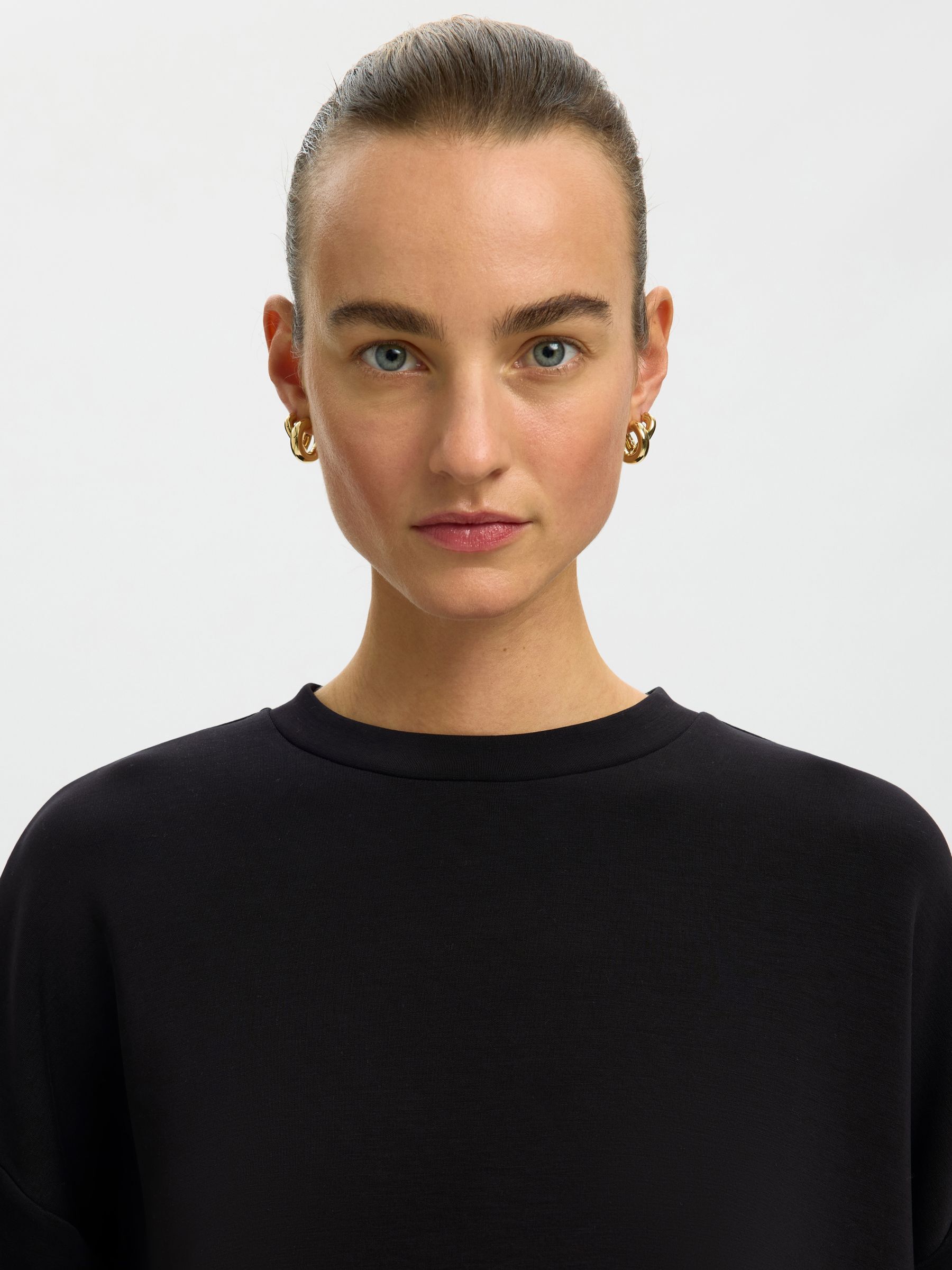 OVERSIZED TOP MET LANGE MOUWEN