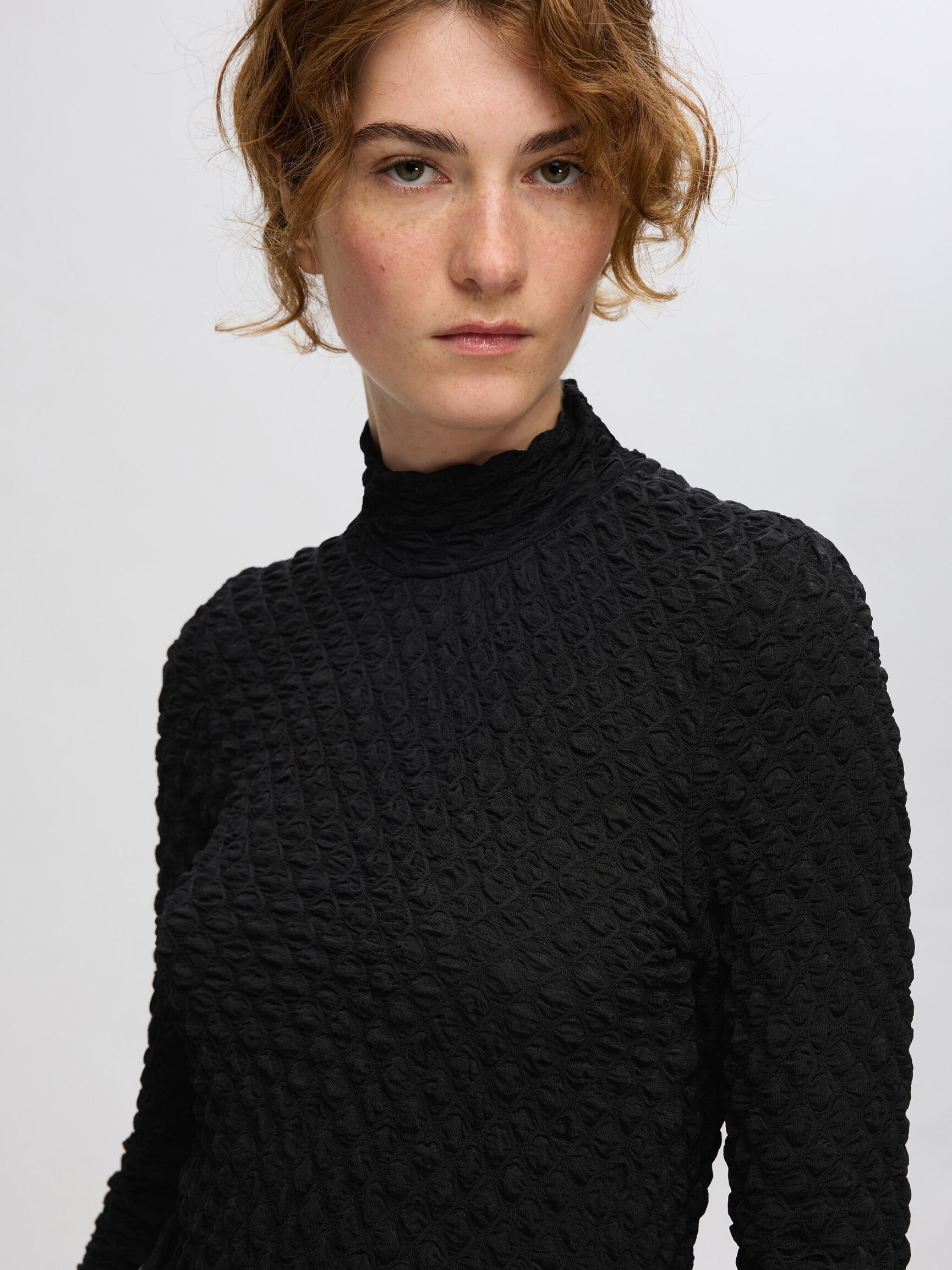 TEXTURED LONG SLEEVED TOP