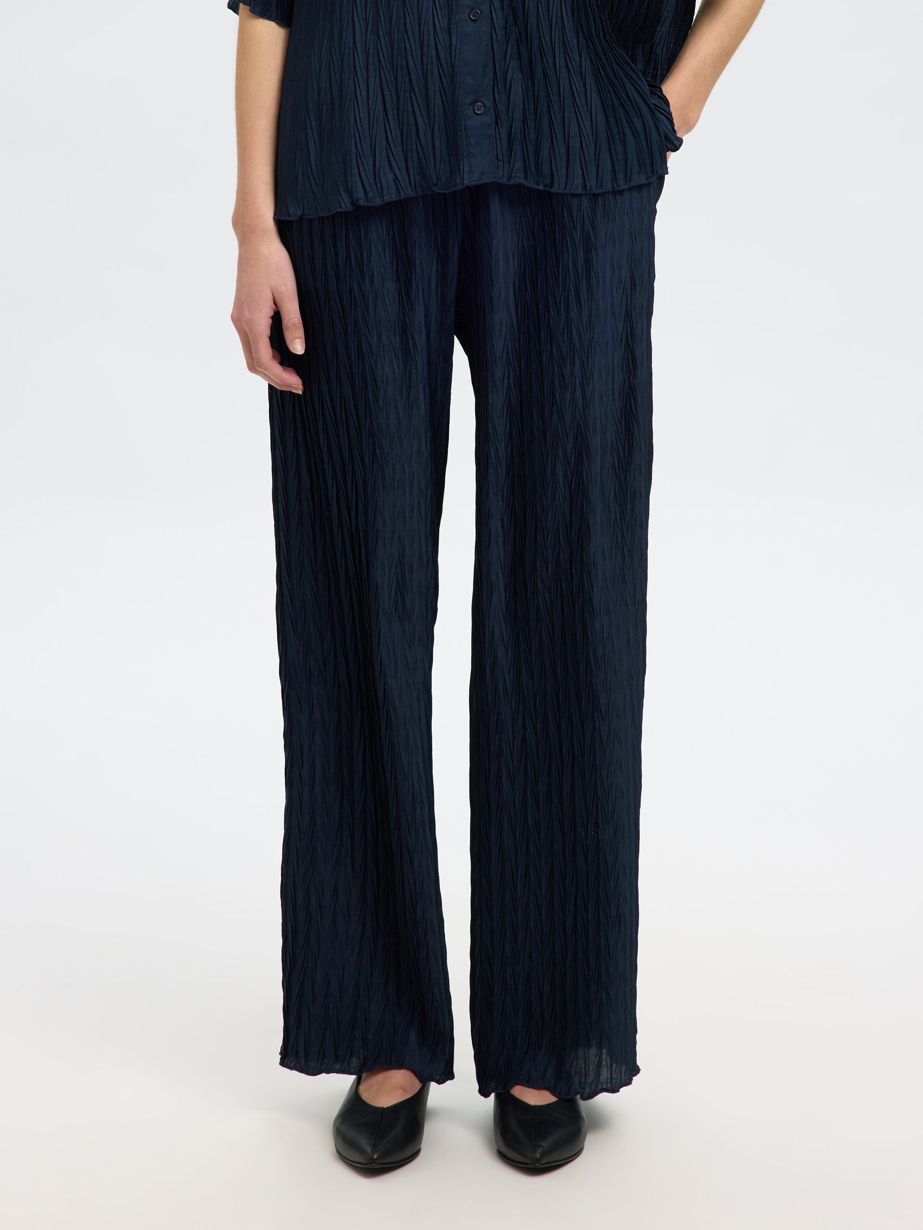 PLISSE WIDE-LEG TROUSERS