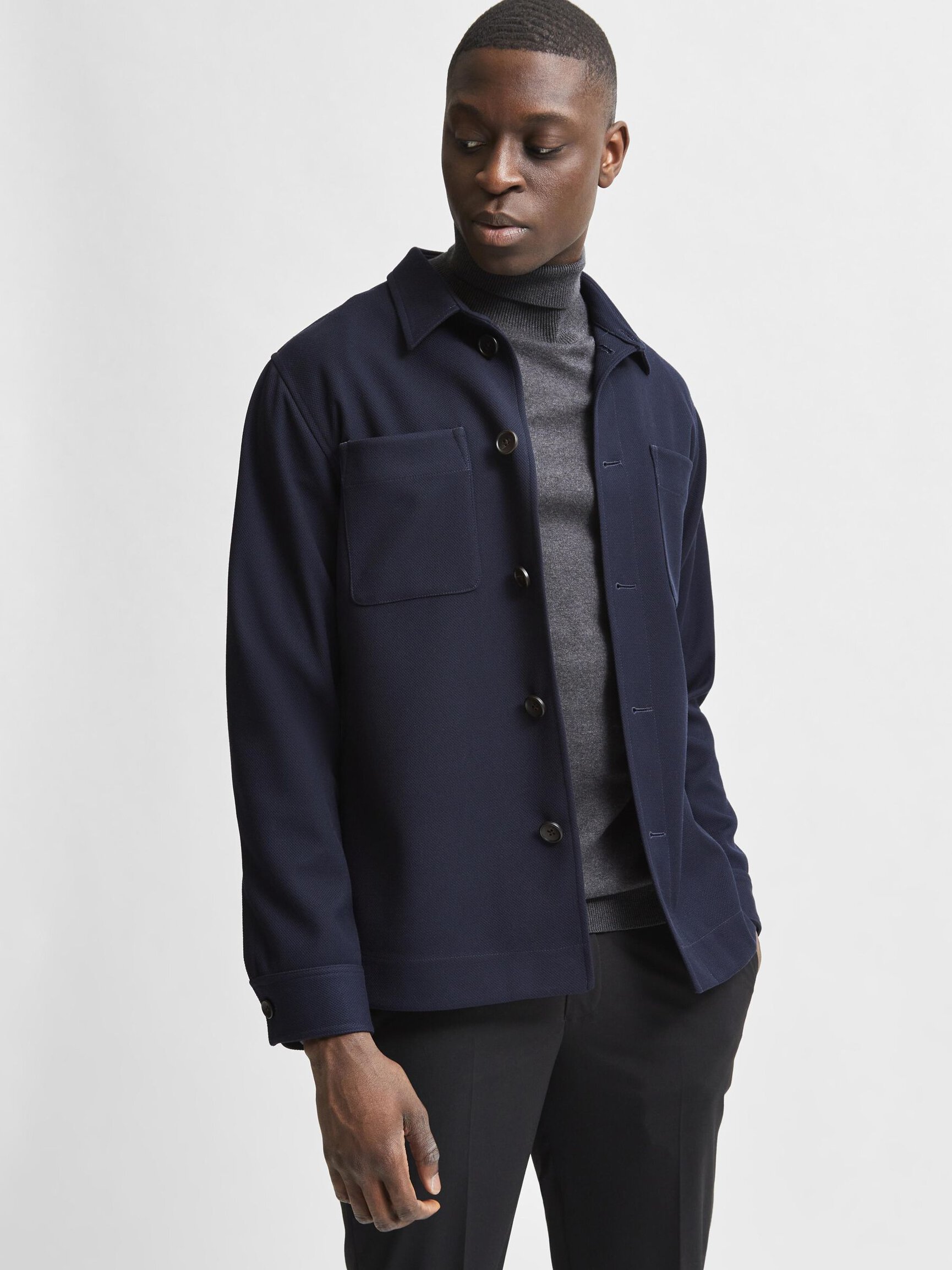 MANGAS LARGAS CON CUELLO ENROLLADO JERSEY