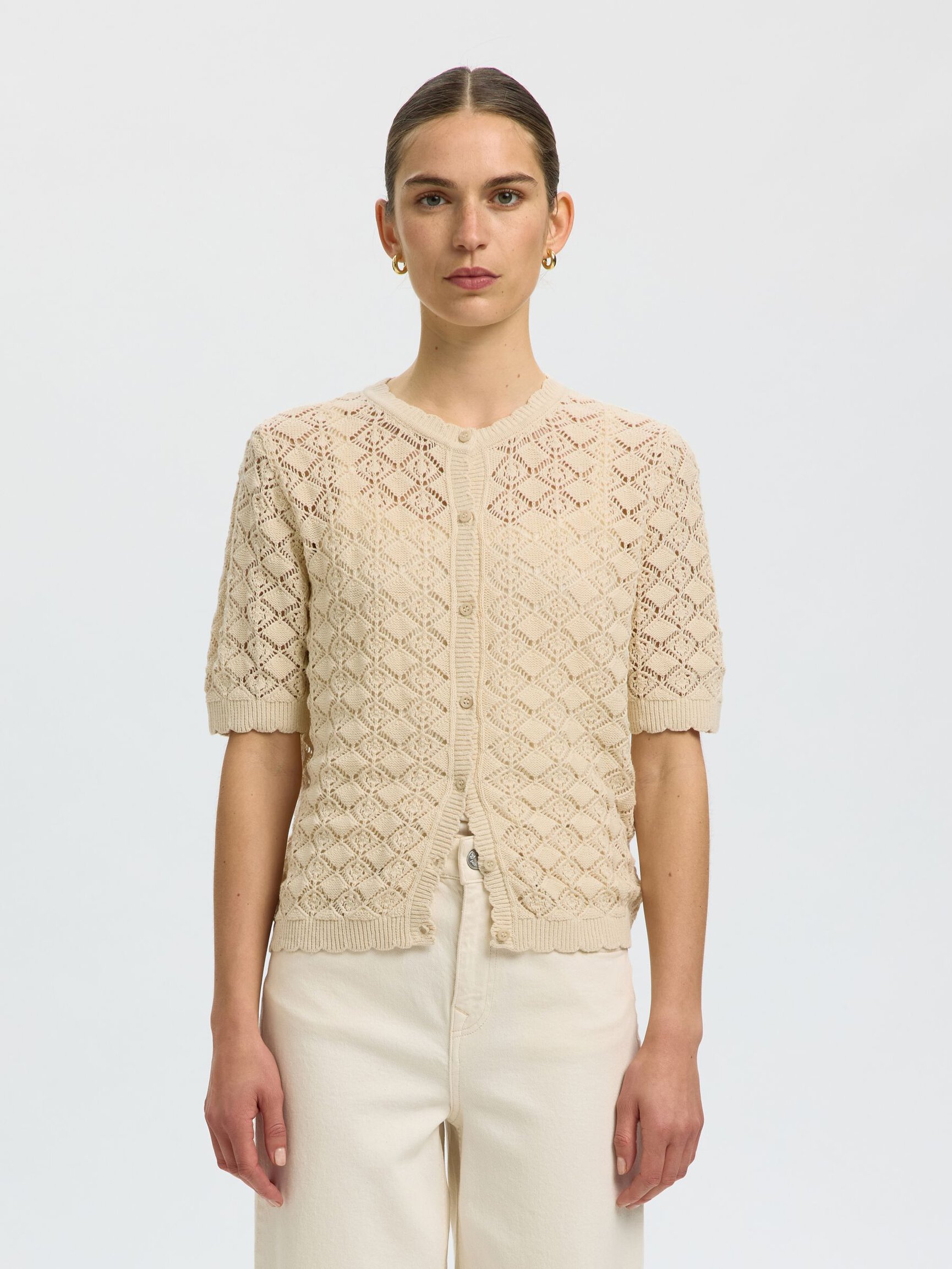 PRENDA DE MANGA CORTA CHAQUETA DE PUNTO