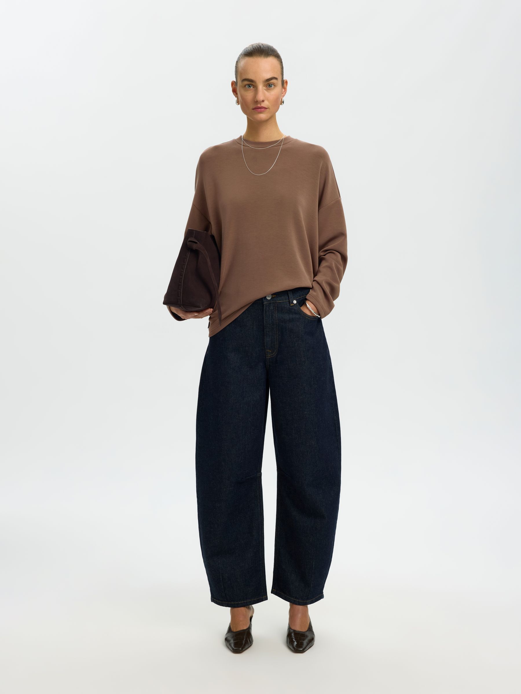 OVERSIZED TOP MET LANGE MOUWEN