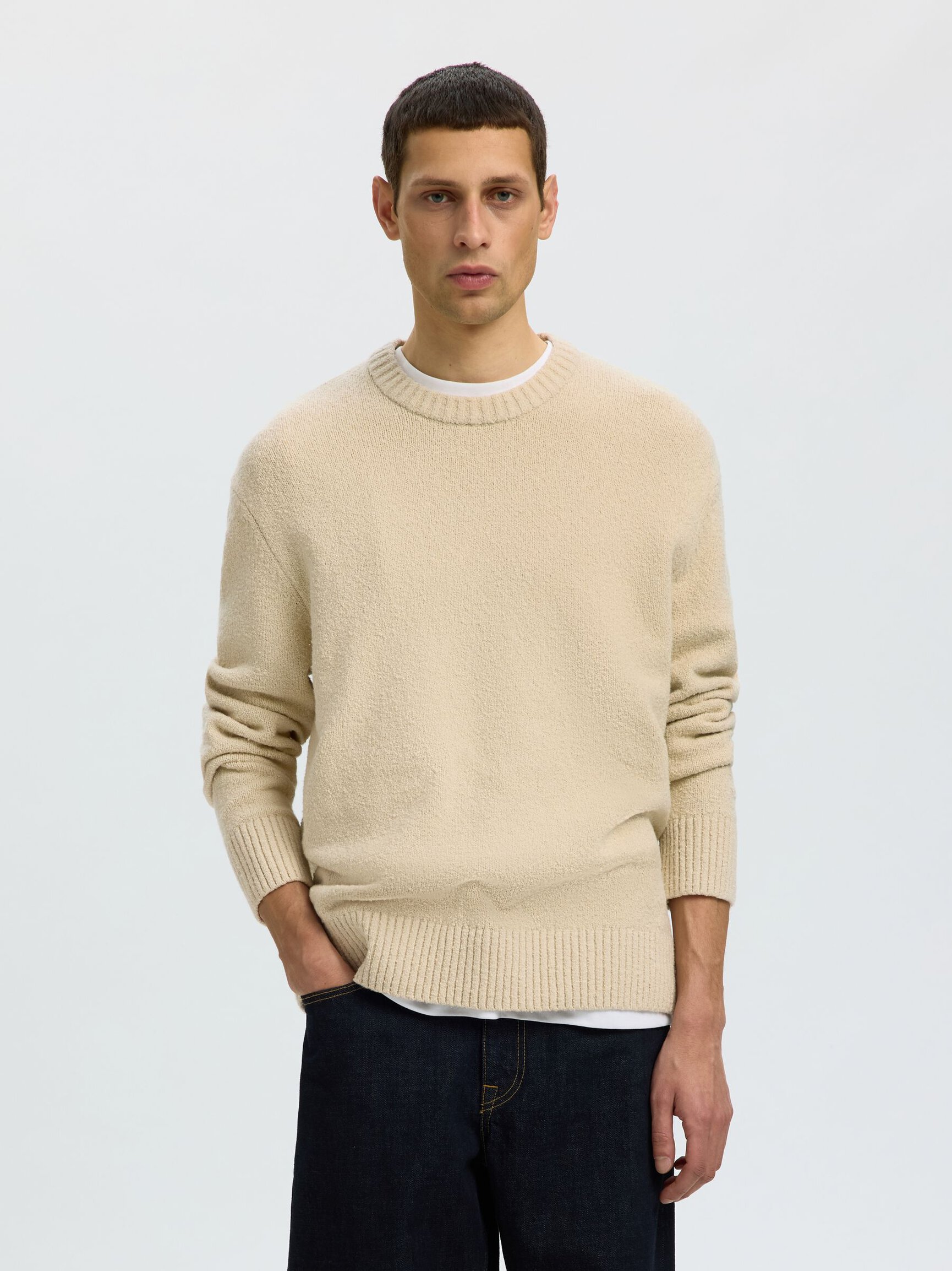 COUPE DÉCONTRACTÉE PULL EN MAILLE