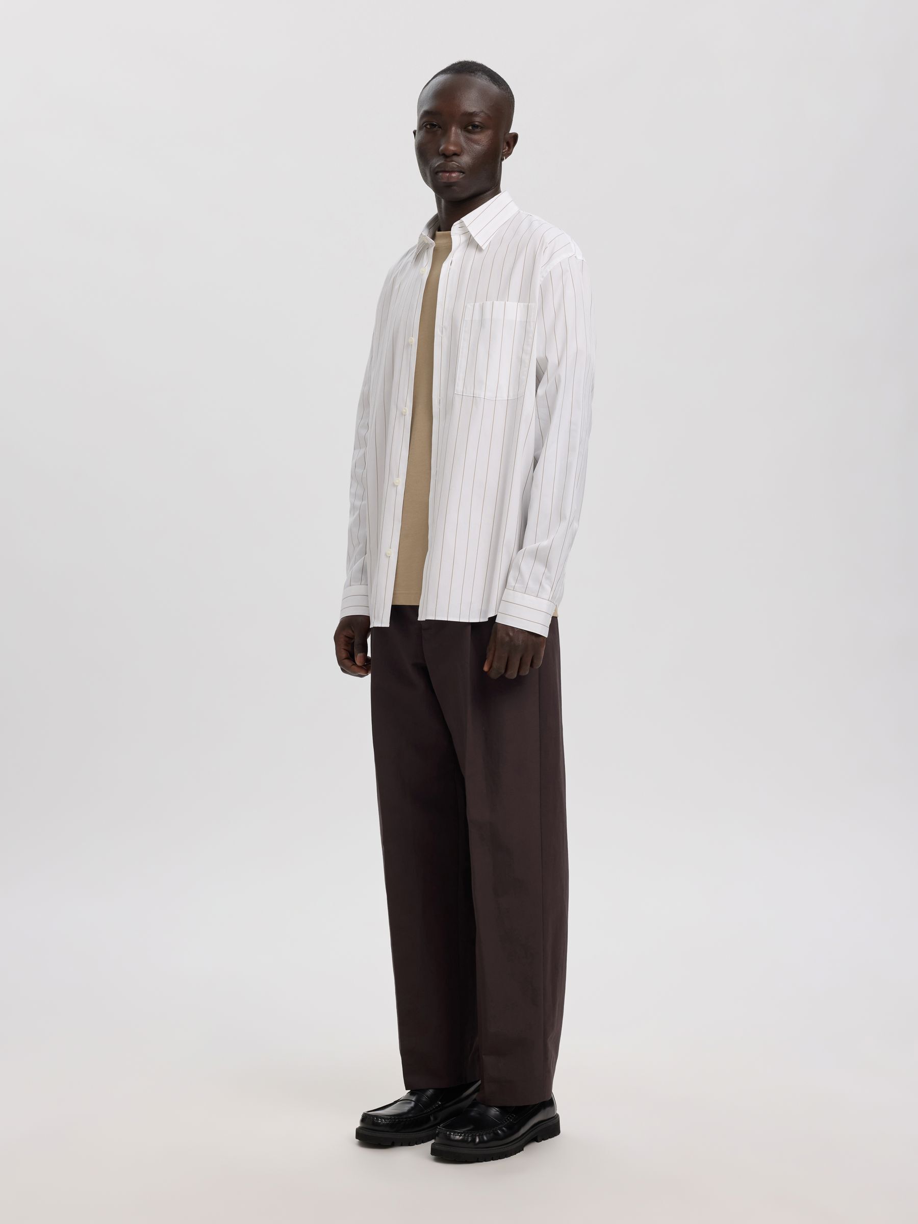 PLEATED LINEN-BLEND TROUSERS