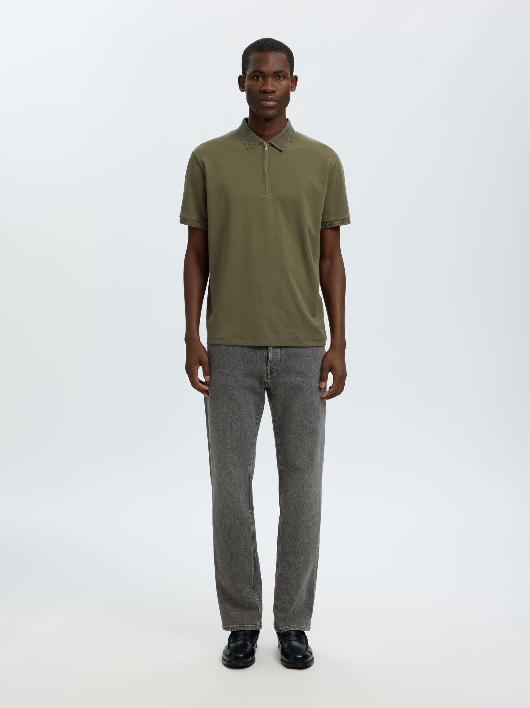 KORTÆRMET LYNLÅS STRIKKET POLOSHIRT